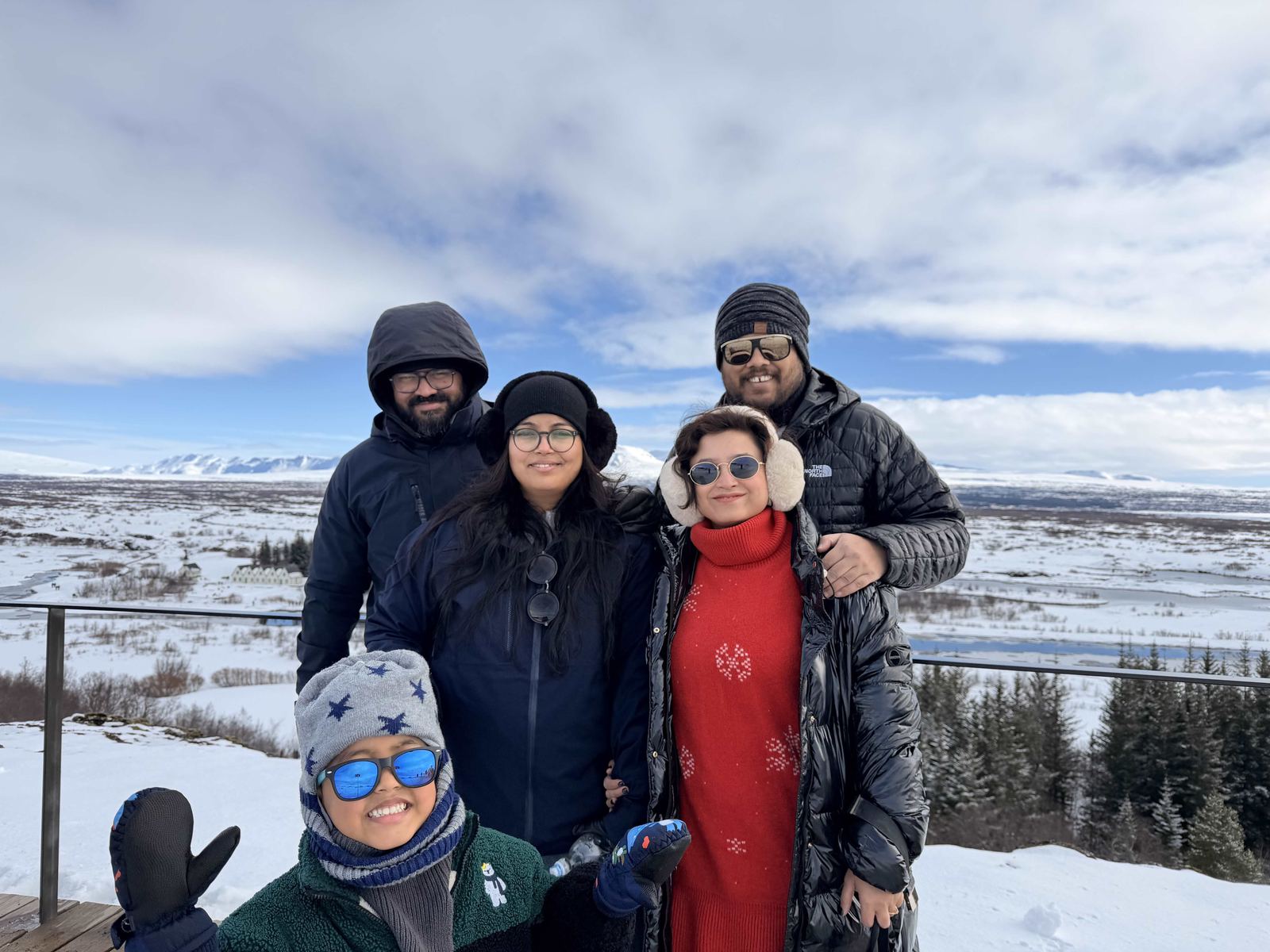 The full crew at Thingvellir — all five, snow-covered valley behind