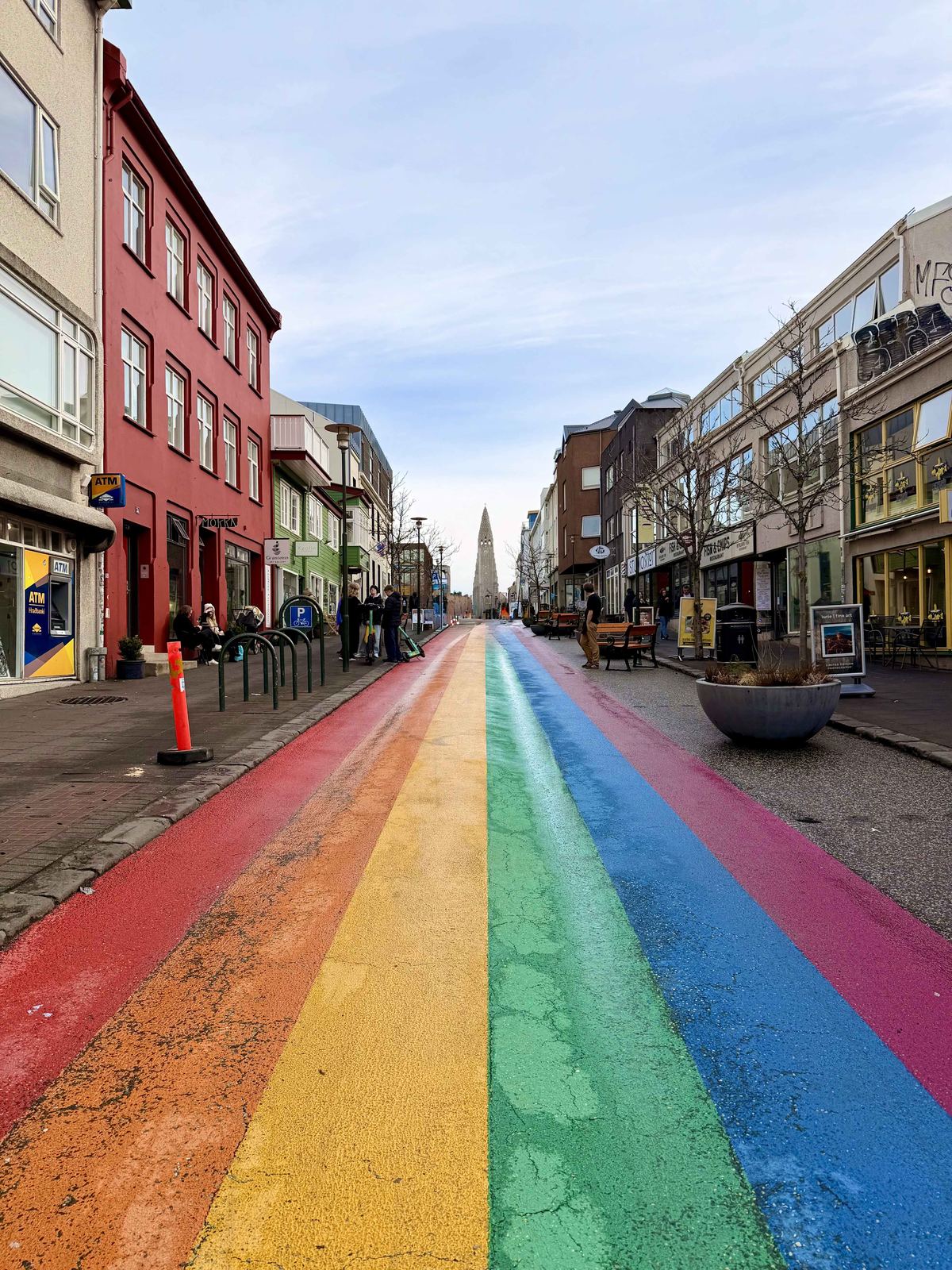 Rainbow Road — Skólavörðustígur with Hallgrímskirkja framed at the far end